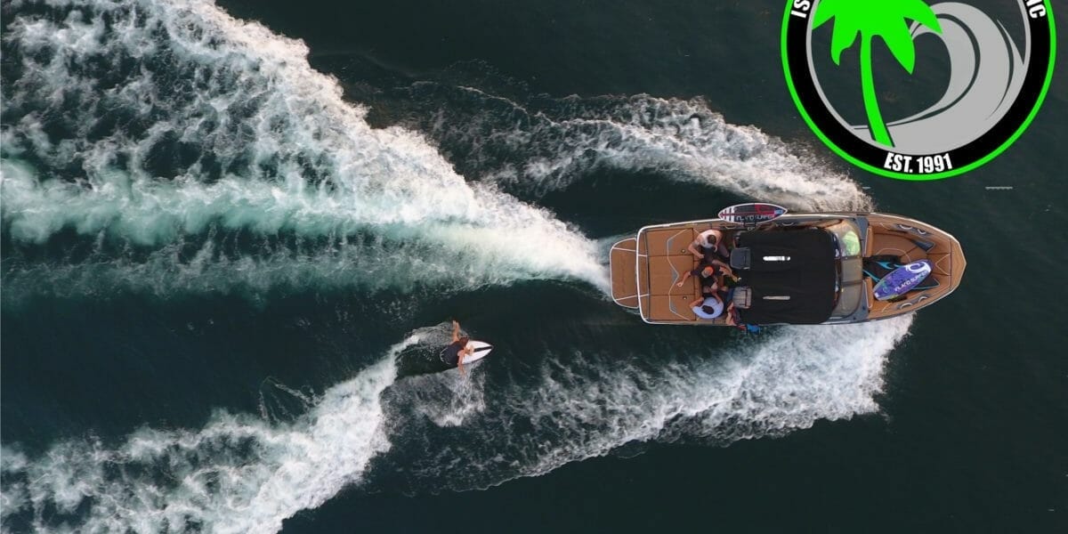 An aerial view of a Supreme Boat sailing through the water.