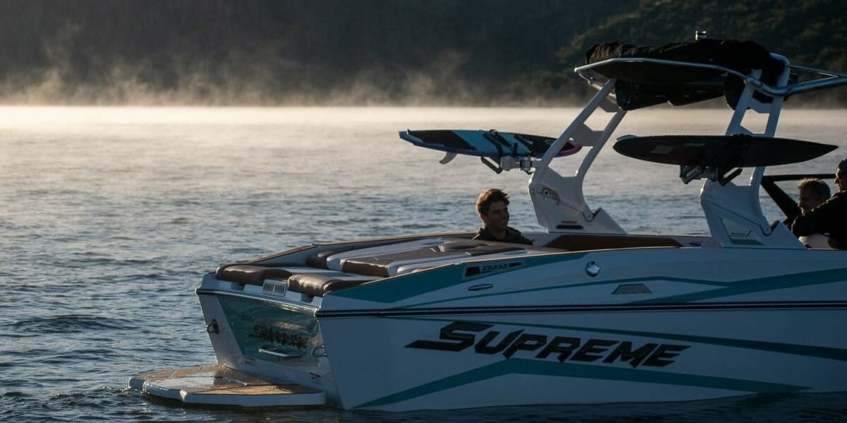 A Supreme logo boat in the water.