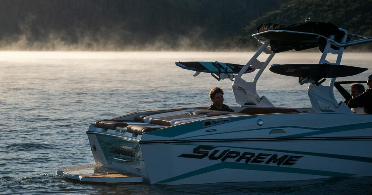 A Supreme logo boat in the water.