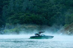 Side of a Supreme S240 boat in steaming water