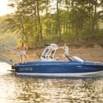 Woman walking down boat ramp to a Supreme boat