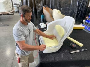 Man building custom boat seat