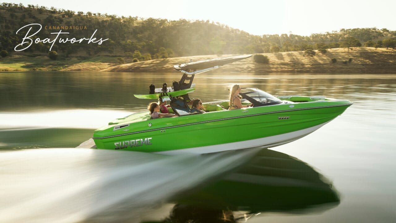 A bright green speedboat from Centurion Boats, with four passengers, moves swiftly across a calm lake with hills in the background.